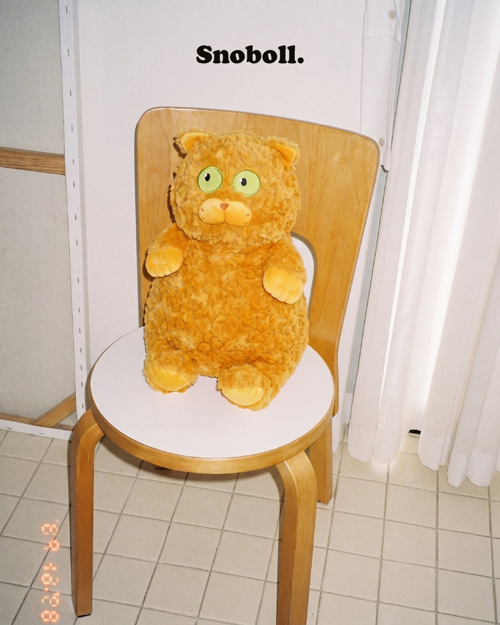 Newton Cat plush toy, lifestyle photo