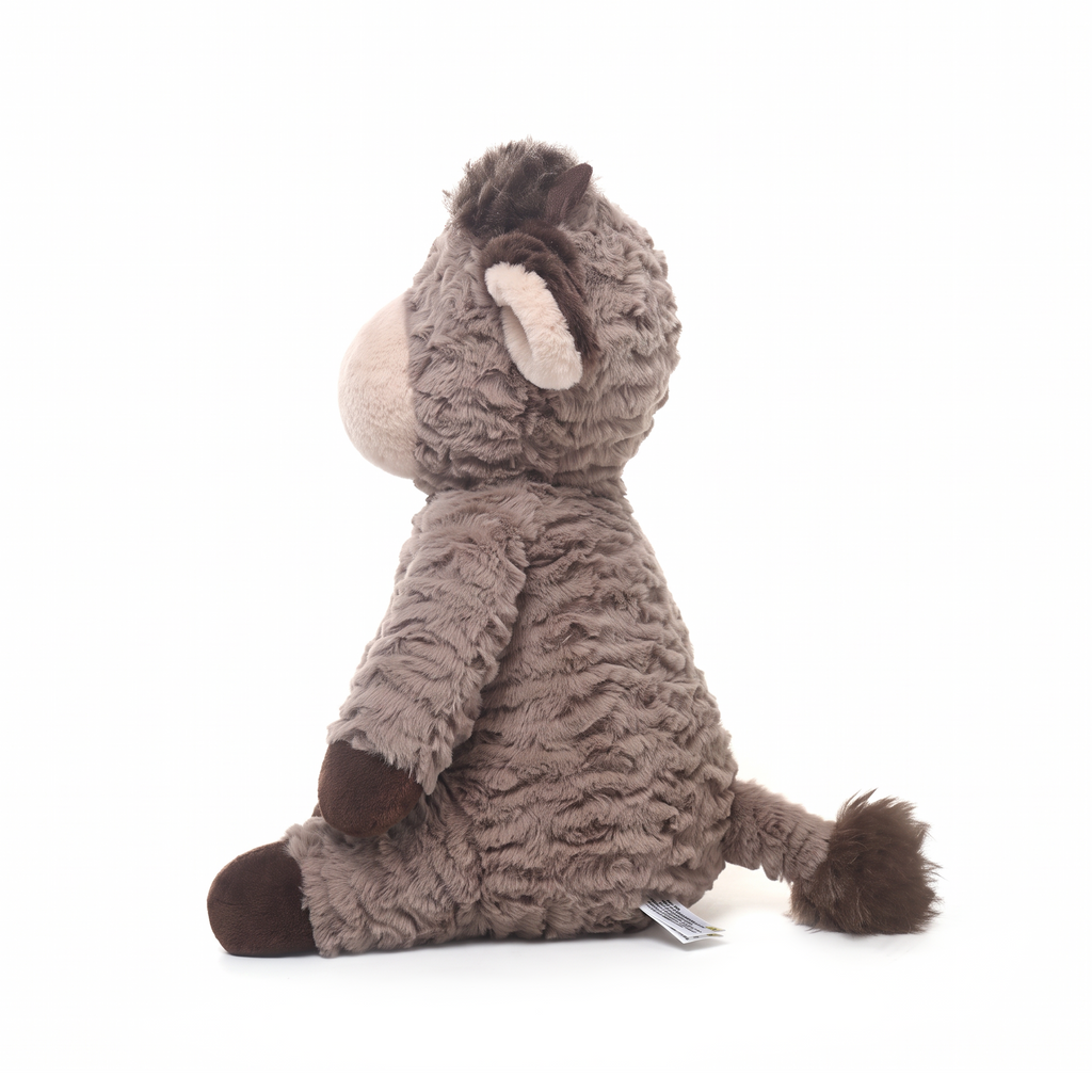 Cody Cow plush stuffed animal toy, side view