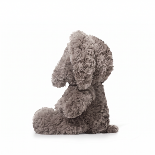 Plush dog toy on a white background