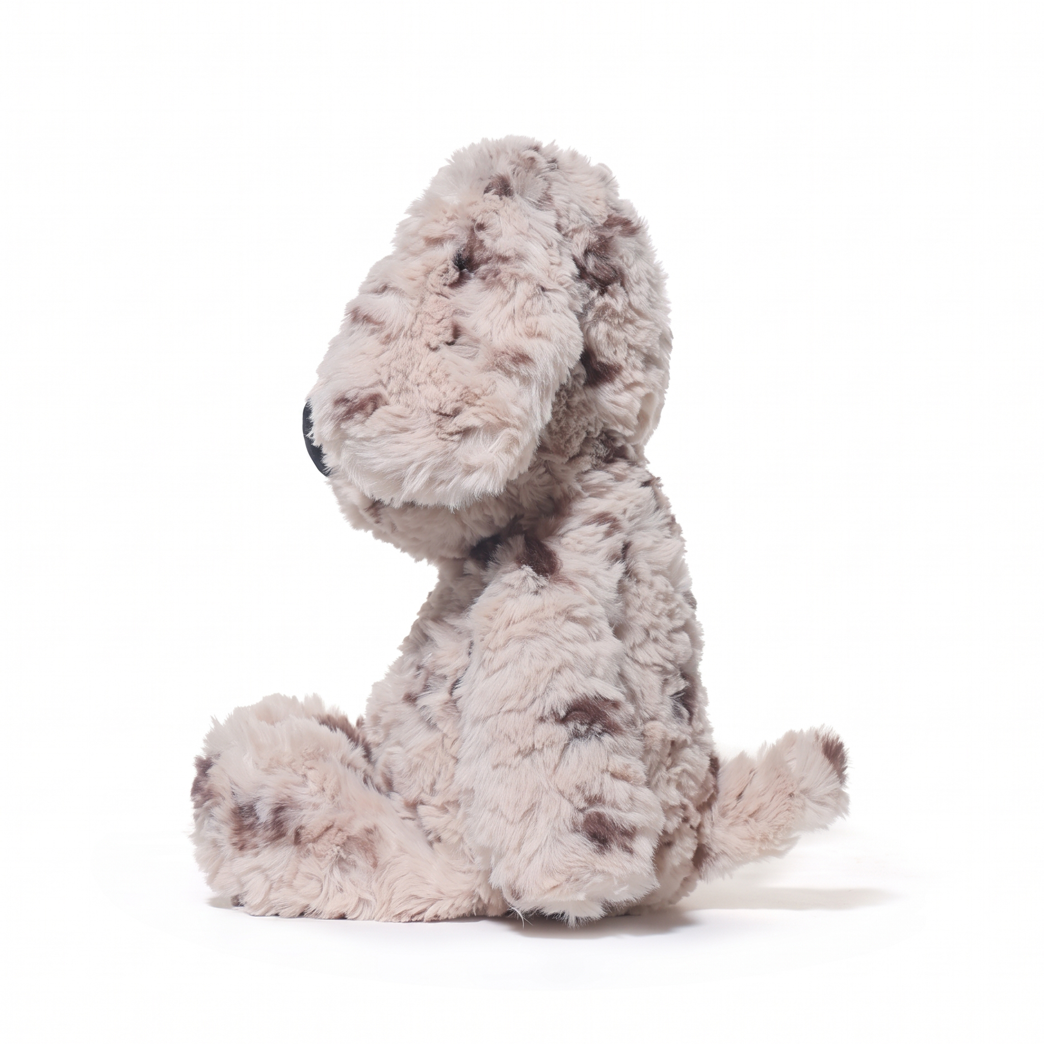 Reki Dog plush stuffed animal toy, side view