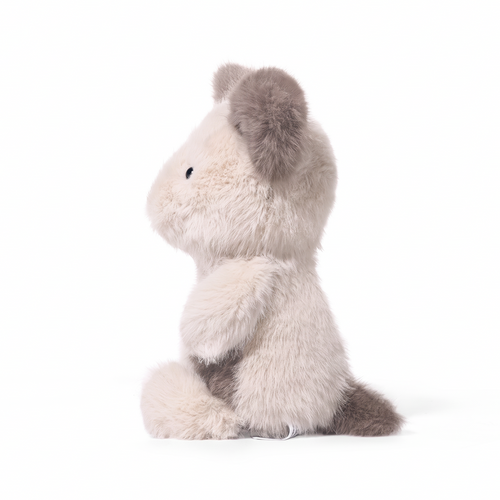 Remi Dog plush stuffed animal toy, side view