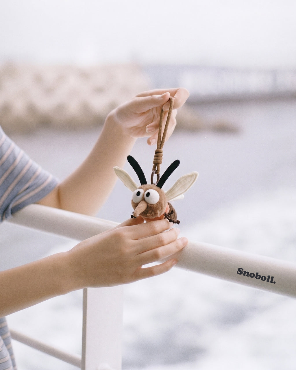 Snoboll plush toy, lifestyle photo