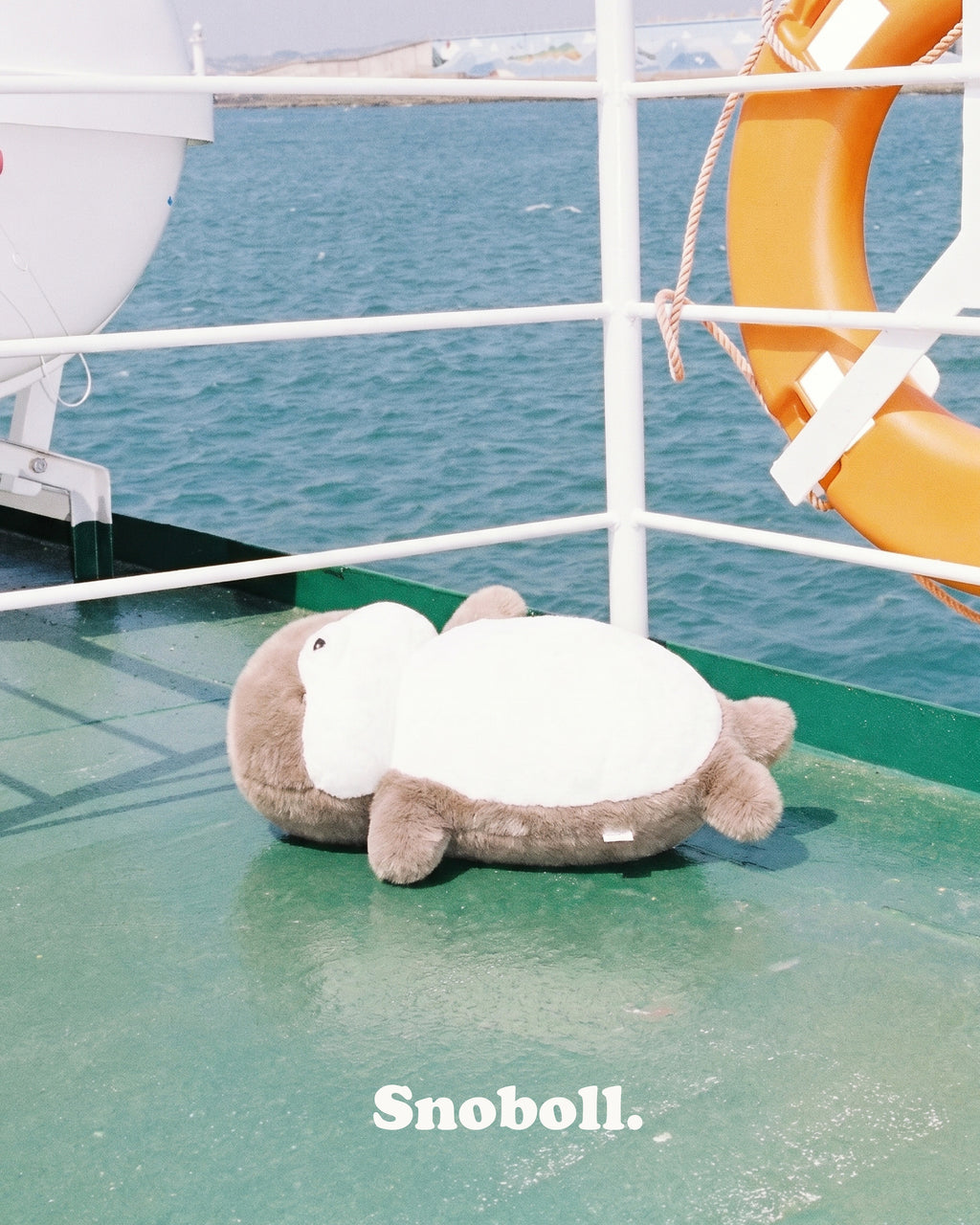 Snoboll plush toy, lifestyle photo