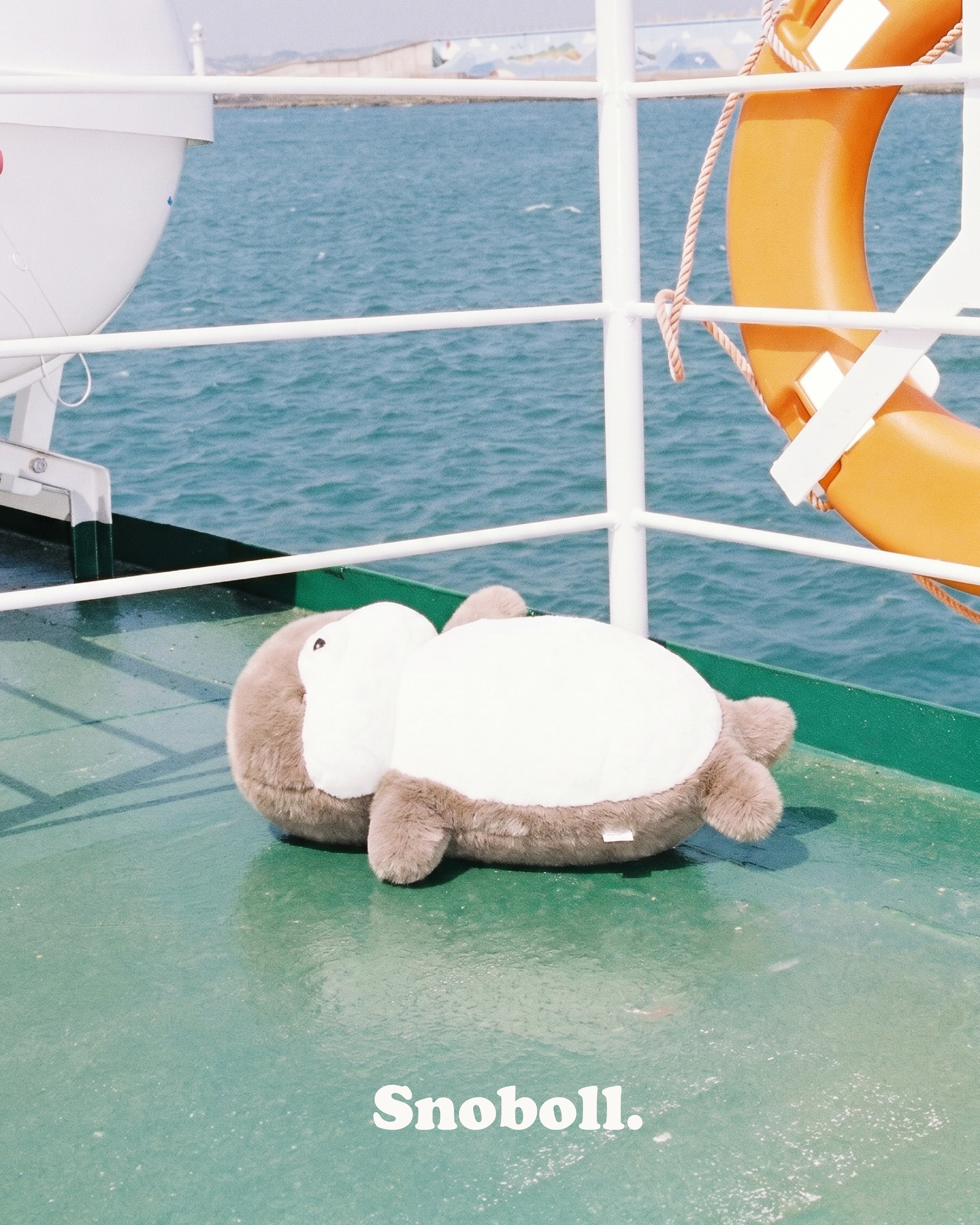 Snoboll plush toy, lifestyle photo